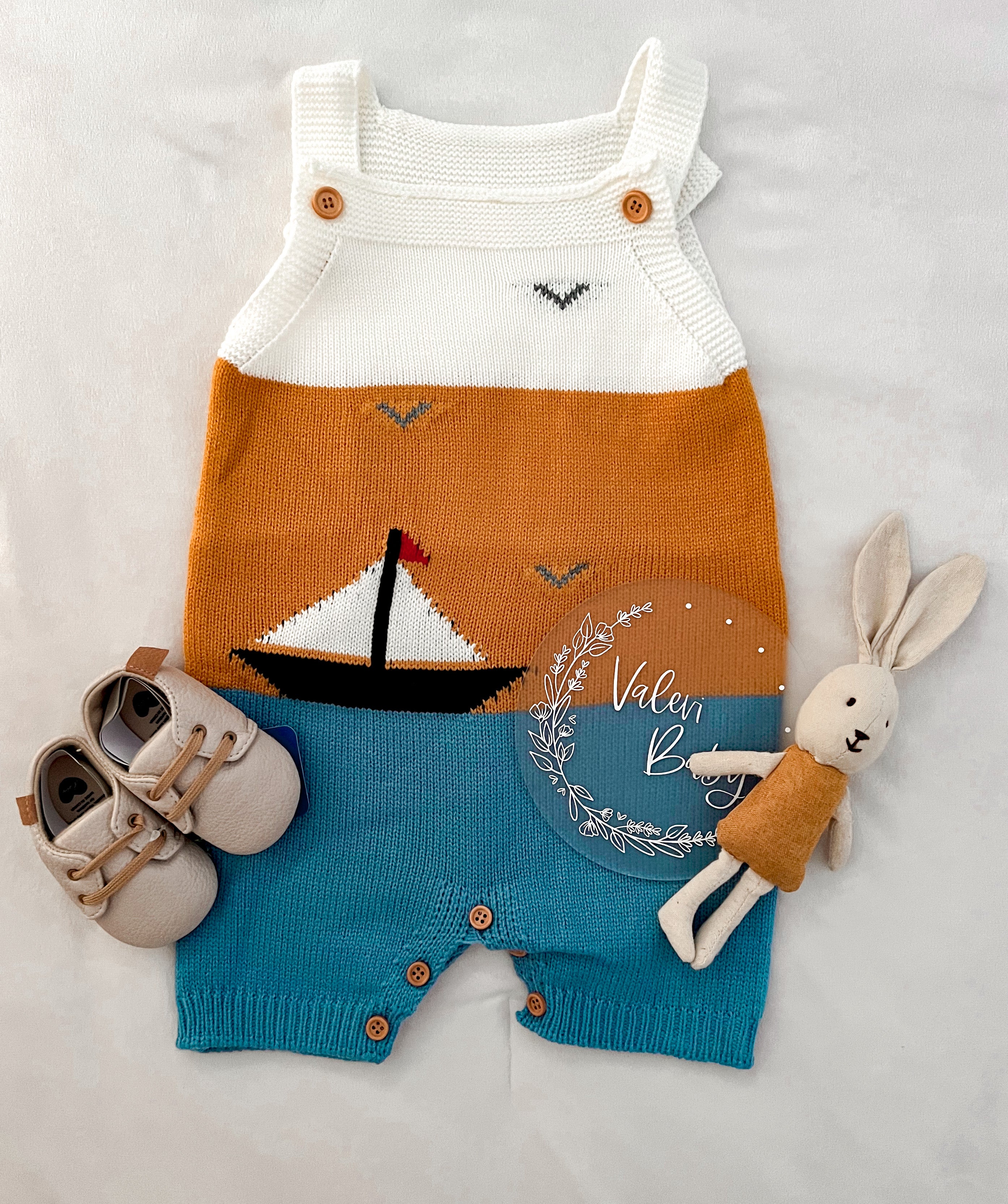 Beach boy knitted romper