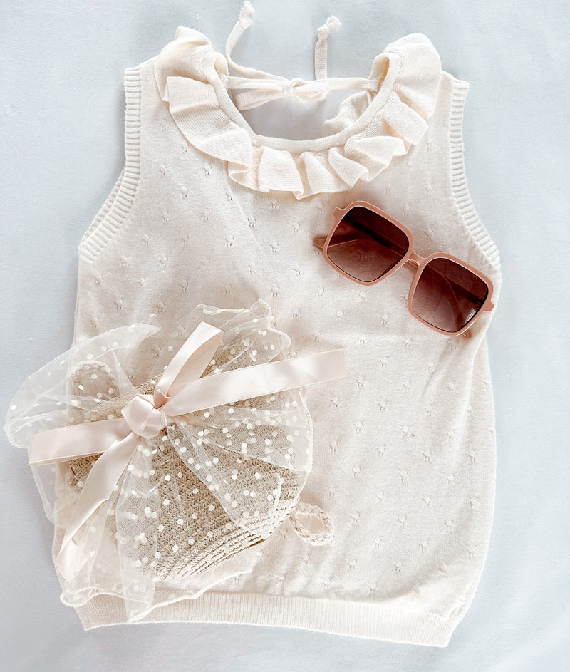 Sleeveless ruffle blouse